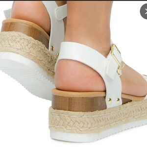 Elegant Cream Sandals with Tan Sole